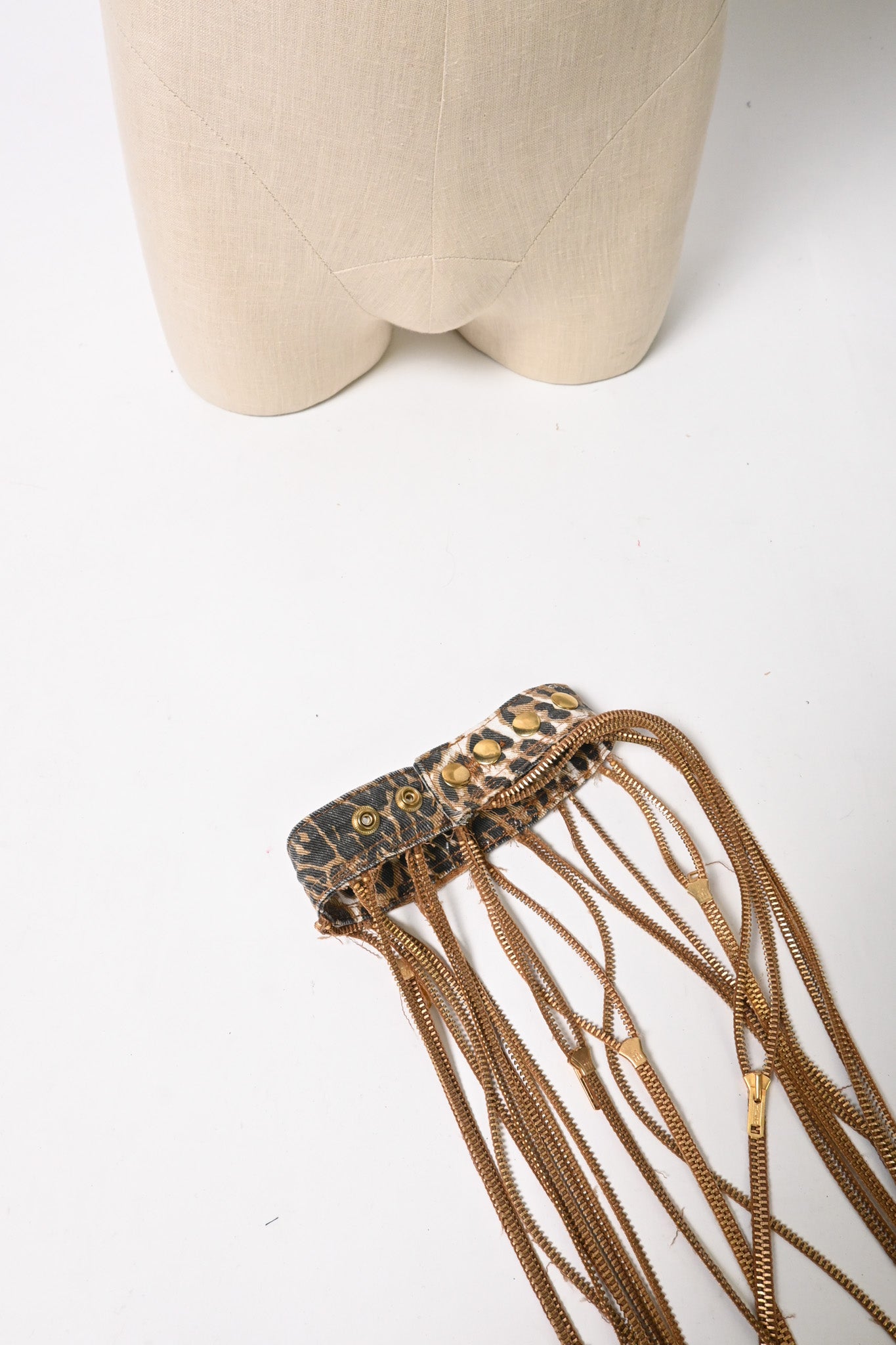 Zipper necklace (find this at Friends Museum)