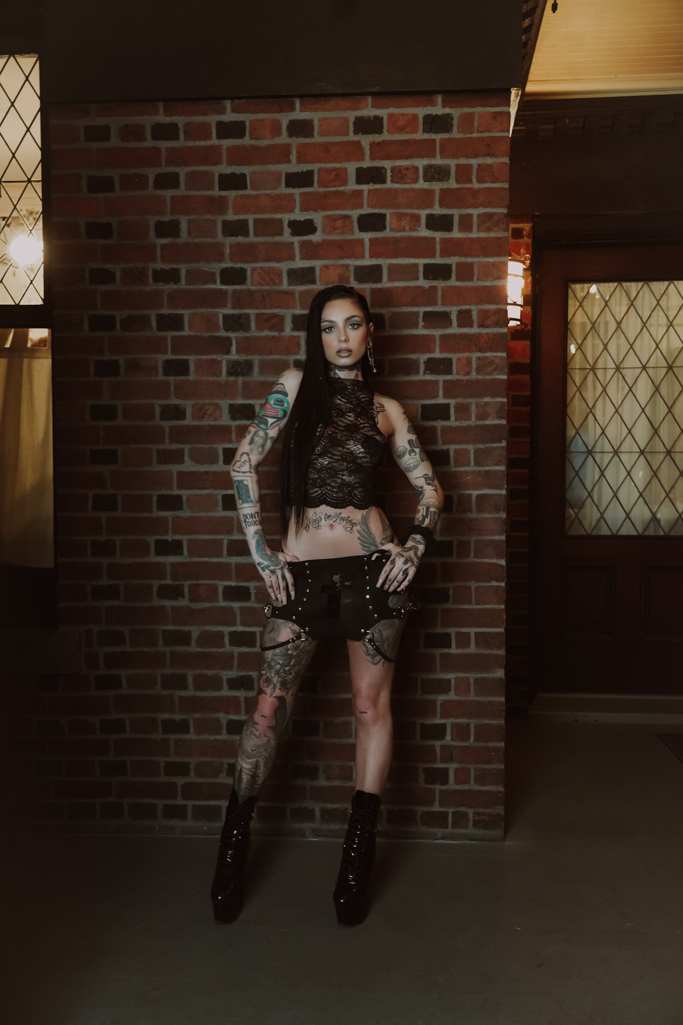 TAYLOR'S Leather cross mini skirt