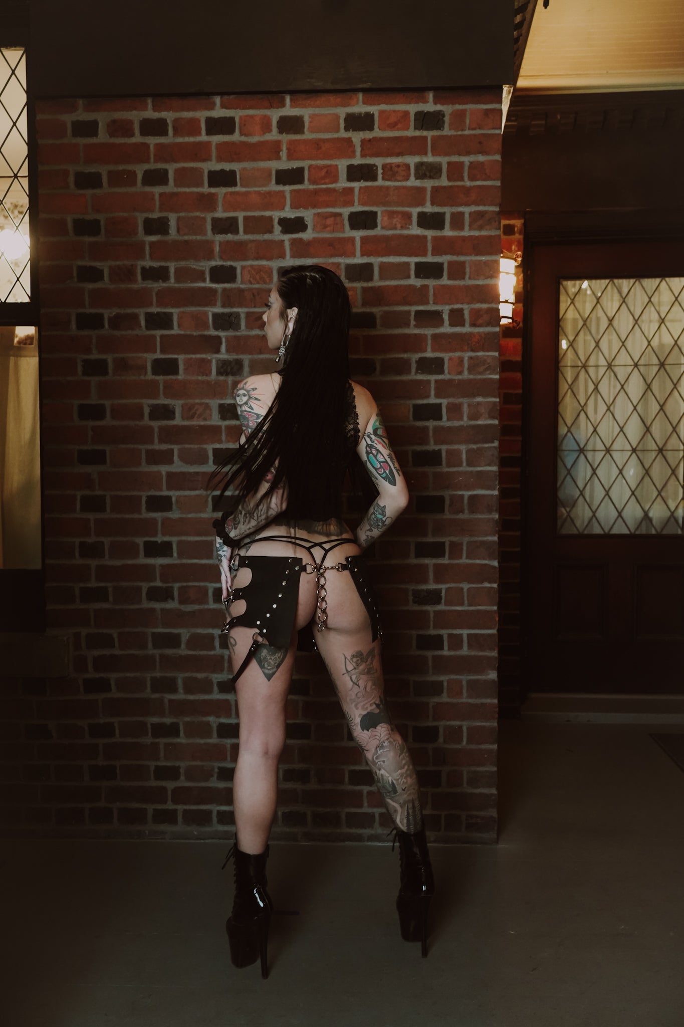 TAYLOR'S Leather cross mini skirt