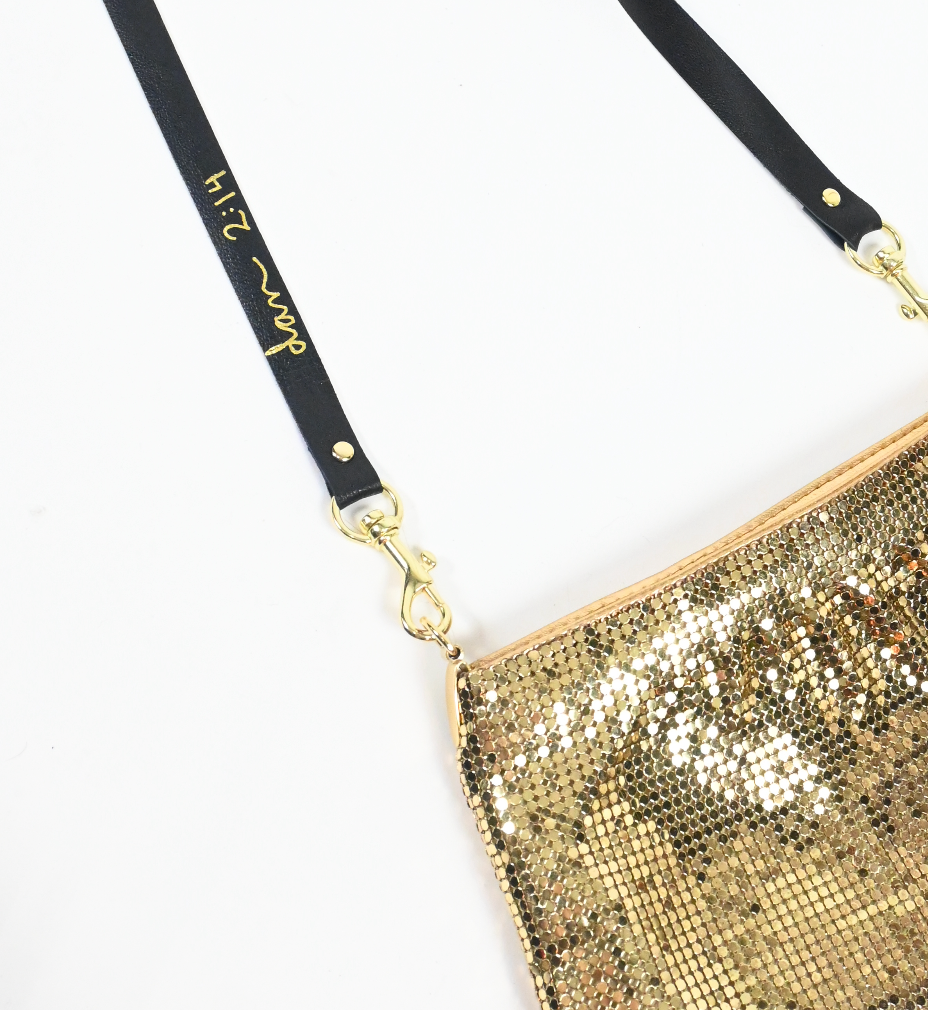 Gold slinky bag